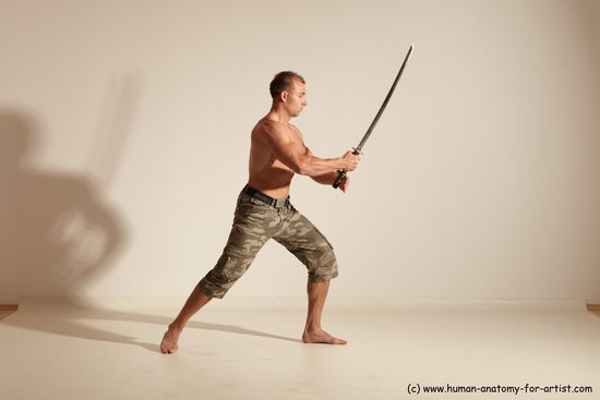 Fighting with sword Man White Moving poses Muscular Short Brown Dynamic poses Academic