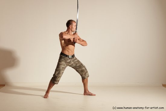 Fighting with sword Man White Moving poses Muscular Short Brown Dynamic poses Academic