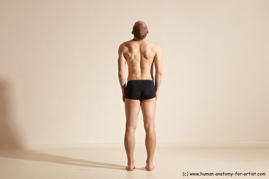 Underwear Gymnastic poses Man White Slim Bald Dancing Dynamic poses Academic