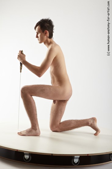 Nude Fighting with sword Man White Kneeling poses - ALL Slim Short Brown Kneeling poses - on one knee Realistic