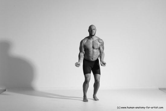 Underwear Gymnastic poses Man Black Muscular Bald Dancing Dynamic poses Academic