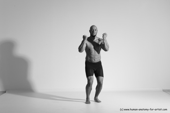 Underwear Gymnastic poses Man Black Muscular Bald Dancing Dynamic poses Academic