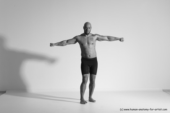 Underwear Gymnastic poses Man Black Muscular Bald Dancing Dynamic poses Academic