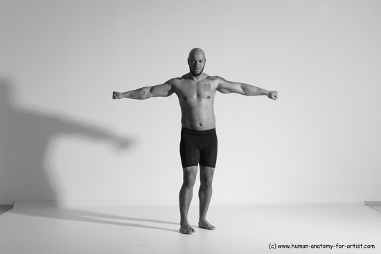 Underwear Gymnastic poses Man Black Muscular Bald Dancing Dynamic poses Academic