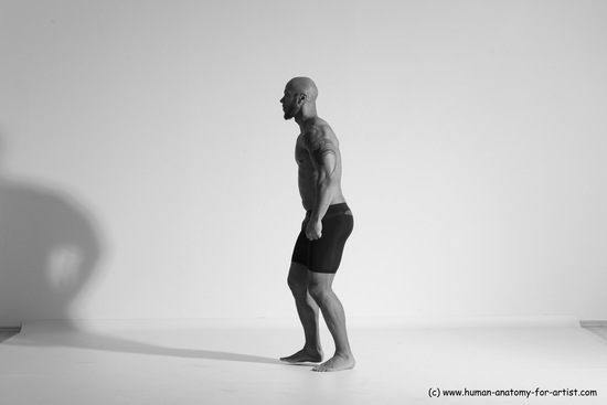 Underwear Gymnastic poses Man Black Muscular Bald Dancing Dynamic poses Academic