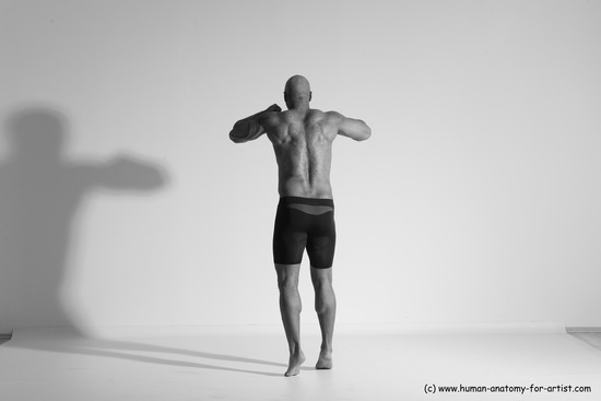 Underwear Gymnastic poses Man Black Muscular Bald Dancing Dynamic poses Academic