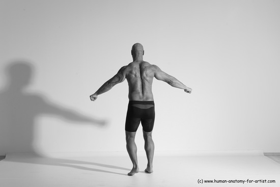 Underwear Gymnastic poses Man Black Muscular Bald Dancing Dynamic poses Academic