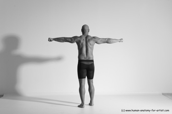 Underwear Gymnastic poses Man Black Muscular Bald Dancing Dynamic poses Academic