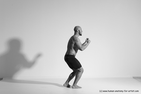 Underwear Gymnastic poses Man Black Muscular Bald Dancing Dynamic poses Academic