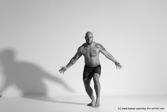 Underwear Gymnastic poses Man Black Muscular Bald Dancing Dynamic poses Academic