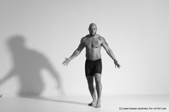 Underwear Gymnastic poses Man Black Muscular Bald Dancing Dynamic poses Academic