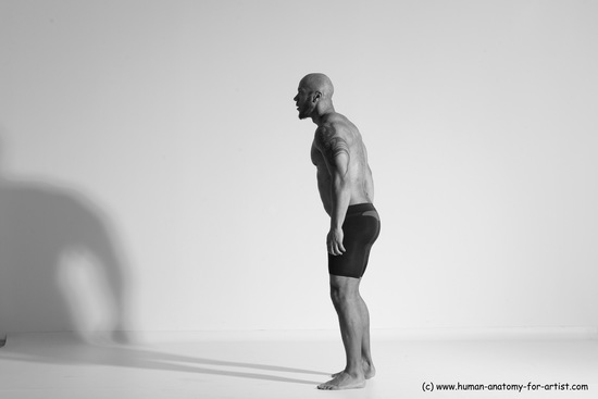 Underwear Gymnastic poses Man Black Muscular Bald Dancing Dynamic poses Academic