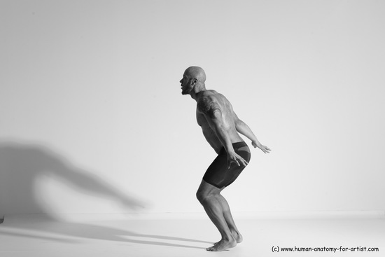 Underwear Gymnastic poses Man Black Muscular Bald Dancing Dynamic poses Academic