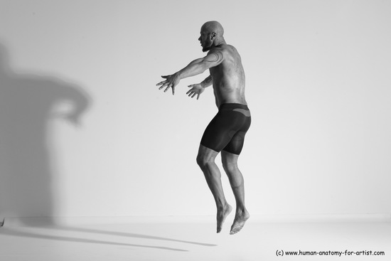 Underwear Gymnastic poses Man Black Muscular Bald Dancing Dynamic poses Academic