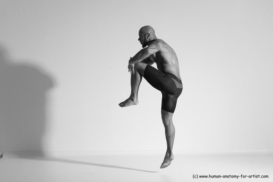 Underwear Gymnastic poses Man Black Muscular Bald Dancing Dynamic poses Academic