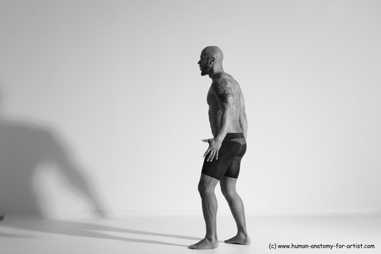 Underwear Gymnastic poses Man Black Muscular Bald Dancing Dynamic poses Academic