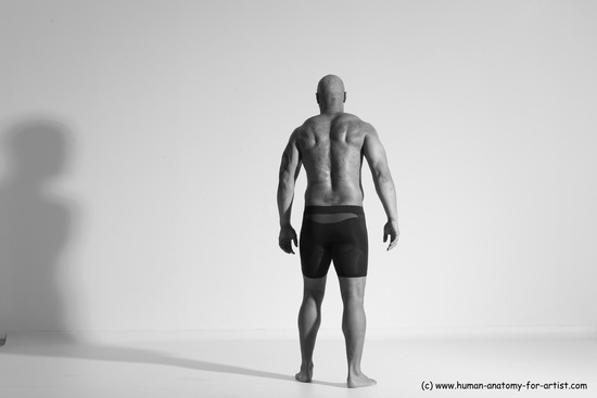 Underwear Gymnastic poses Man Black Muscular Bald Dancing Dynamic poses Academic