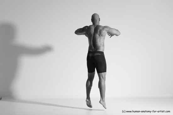 Underwear Gymnastic poses Man Black Muscular Bald Dancing Dynamic poses Academic