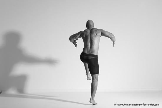 Underwear Gymnastic poses Man Black Muscular Bald Dancing Dynamic poses Academic