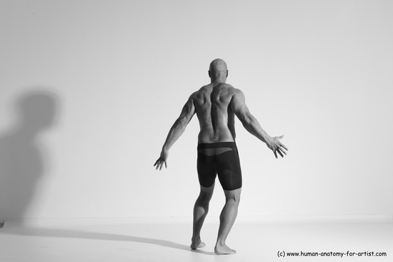 Underwear Gymnastic poses Man Black Muscular Bald Dancing Dynamic poses Academic