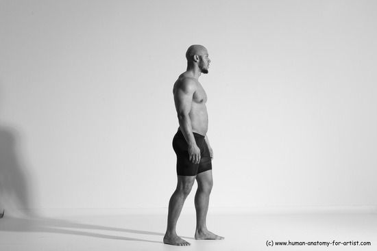 Underwear Gymnastic poses Man Black Muscular Bald Dancing Dynamic poses Academic