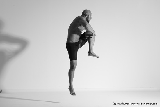 Underwear Gymnastic poses Man Black Muscular Bald Dancing Dynamic poses Academic