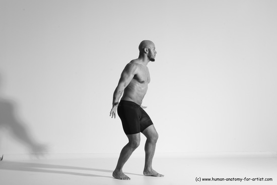 Underwear Gymnastic poses Man Black Muscular Bald Dancing Dynamic poses Academic