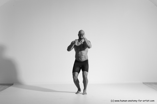 Underwear Gymnastic poses Man Black Muscular Bald Dancing Dynamic poses Academic