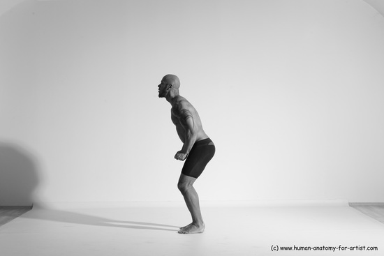 Underwear Gymnastic poses Man Black Muscular Bald Dancing Dynamic poses Academic