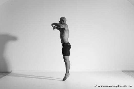 Underwear Gymnastic poses Man Black Muscular Bald Dancing Dynamic poses Academic