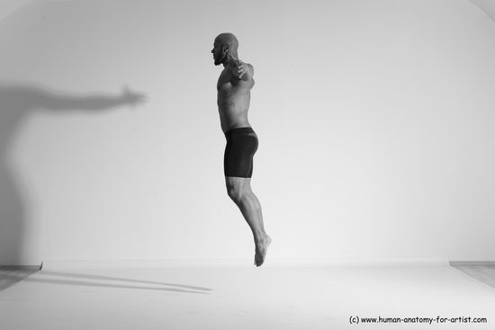 Underwear Gymnastic poses Man Black Muscular Bald Dancing Dynamic poses Academic