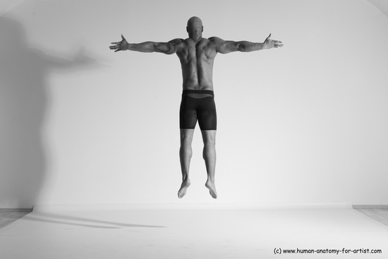 Underwear Gymnastic poses Man Black Muscular Bald Dancing Dynamic poses Academic