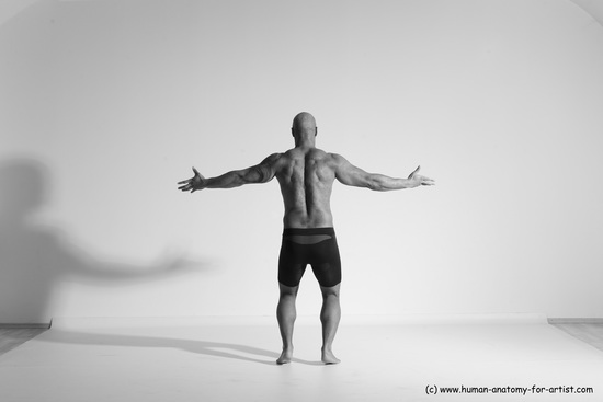 Underwear Gymnastic poses Man Black Muscular Bald Dancing Dynamic poses Academic