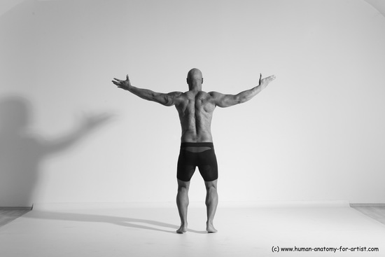 Underwear Gymnastic poses Man Black Muscular Bald Dancing Dynamic poses Academic