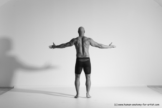 Underwear Gymnastic poses Man Black Muscular Bald Dancing Dynamic poses Academic