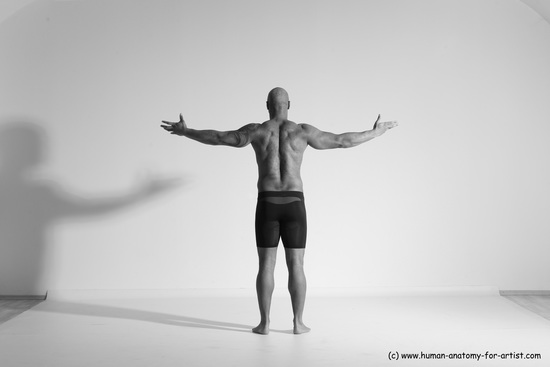 Underwear Gymnastic poses Man Black Muscular Bald Dancing Dynamic poses Academic