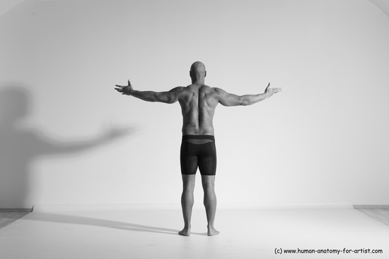 Underwear Gymnastic poses Man Black Muscular Bald Dancing Dynamic poses Academic