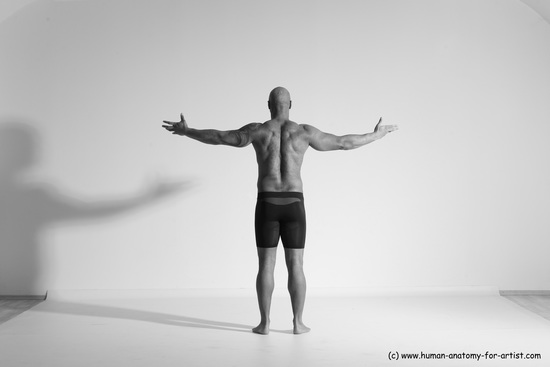 Underwear Gymnastic poses Man Black Muscular Bald Dancing Dynamic poses Academic