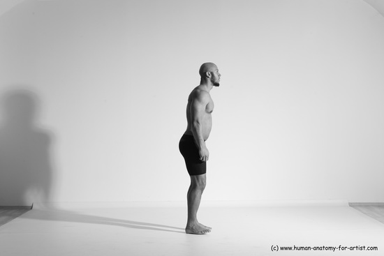 Underwear Gymnastic poses Man Black Muscular Bald Dancing Dynamic poses Academic