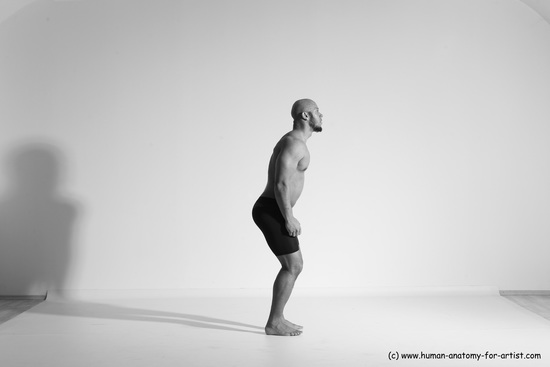 Underwear Gymnastic poses Man Black Muscular Bald Dancing Dynamic poses Academic