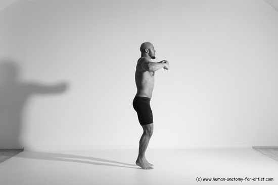 Underwear Gymnastic poses Man Black Muscular Bald Dancing Dynamic poses Academic