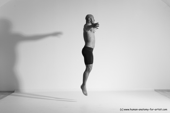 Underwear Gymnastic poses Man Black Muscular Bald Dancing Dynamic poses Academic