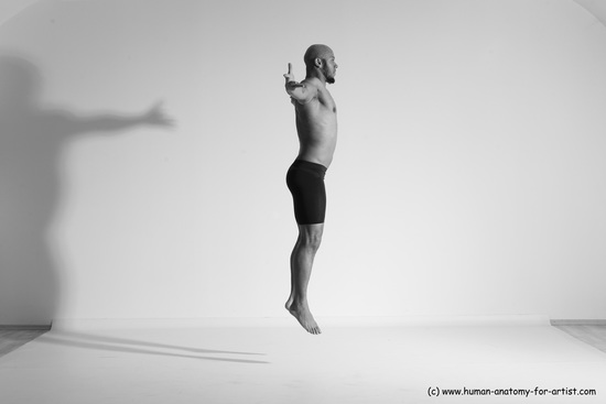 Underwear Gymnastic poses Man Black Muscular Bald Dancing Dynamic poses Academic