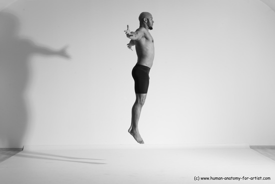 Underwear Gymnastic poses Man Black Muscular Bald Dancing Dynamic poses Academic