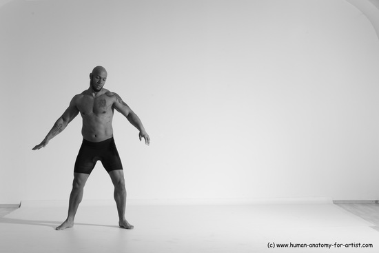 Underwear Gymnastic poses Man Black Muscular Bald Dancing Dynamic poses Academic