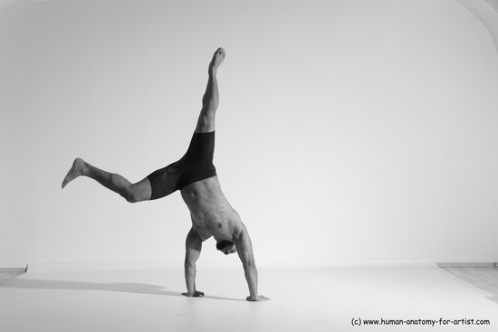 Underwear Gymnastic poses Man Black Muscular Bald Dancing Dynamic poses Academic