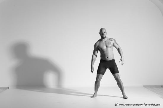 Underwear Gymnastic poses Man Black Muscular Bald Dancing Dynamic poses Academic