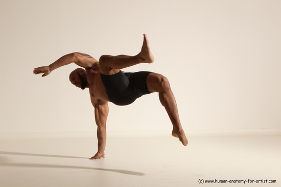 Underwear Gymnastic poses Man Black Muscular Bald Dancing Dynamic poses Academic