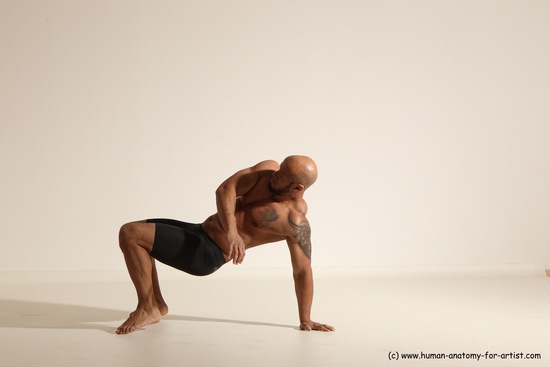 Underwear Gymnastic poses Man Black Muscular Bald Dancing Dynamic poses Academic