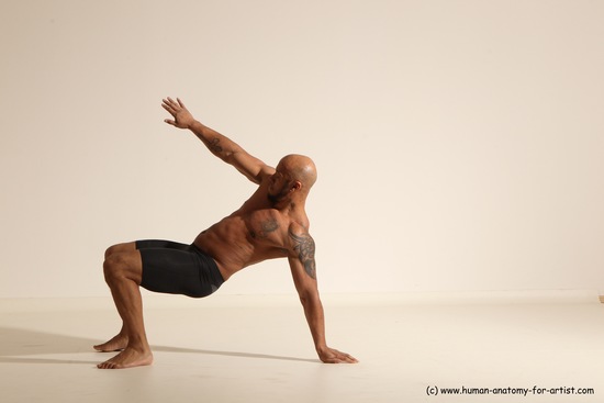 Underwear Gymnastic poses Man Black Muscular Bald Dancing Dynamic poses Academic